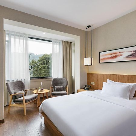 Hangzhou Puyu Travelling With Hotel Buitenkant foto