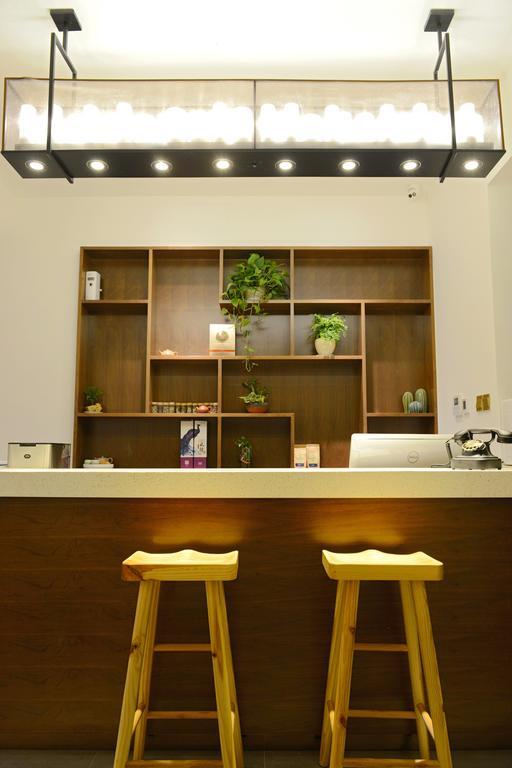 Hangzhou Puyu Travelling With Hotel Buitenkant foto