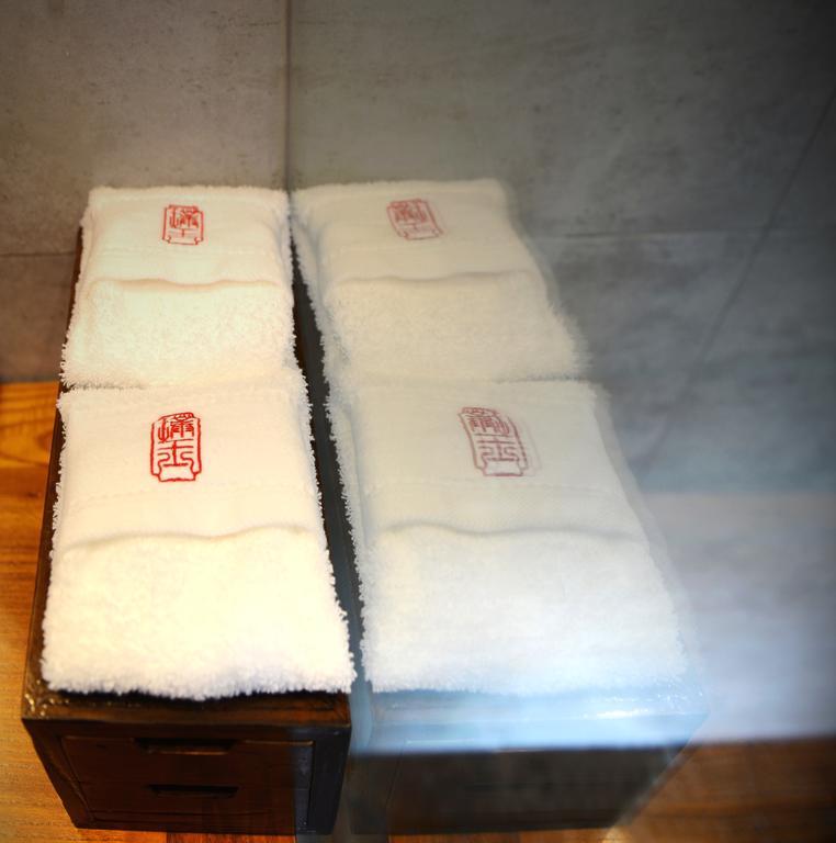 Hangzhou Puyu Travelling With Hotel Buitenkant foto