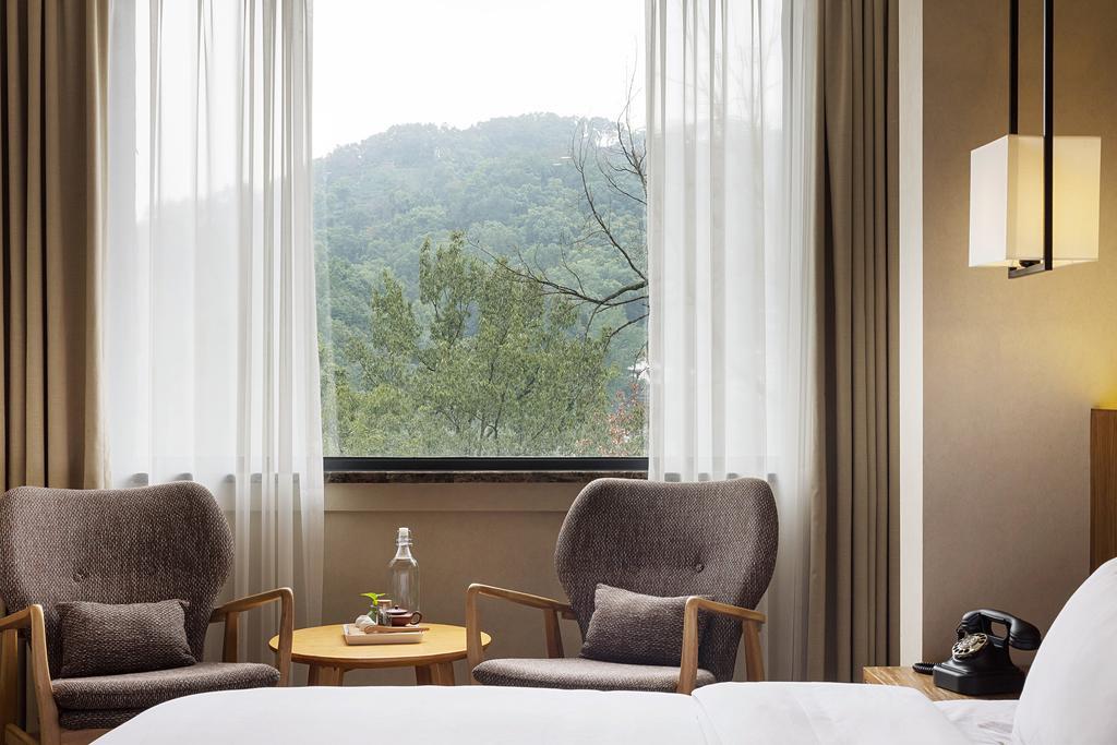 Hangzhou Puyu Travelling With Hotel Buitenkant foto