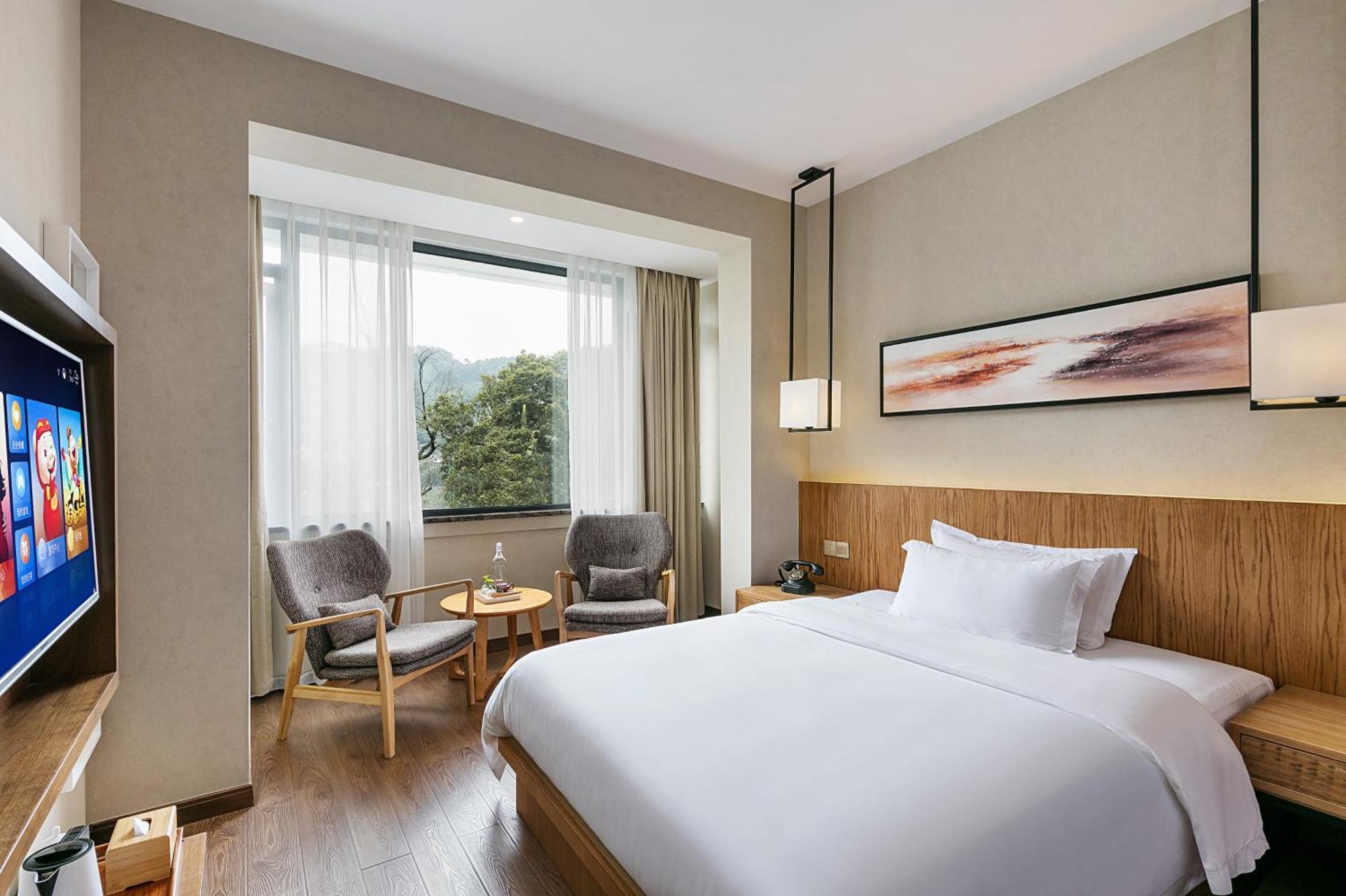 Hangzhou Puyu Travelling With Hotel Buitenkant foto