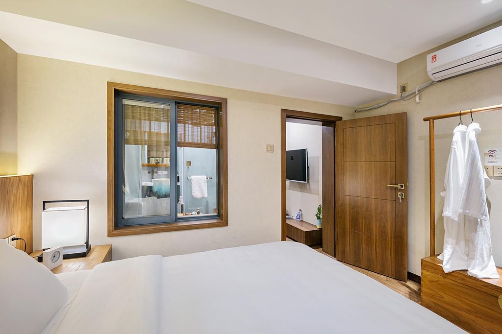 Hangzhou Puyu Travelling With Hotel Buitenkant foto